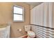 Updated bathroom with a shower/tub combo at 1406 E Spencer St, Plant City, FL 33563