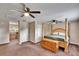 Large main bedroom with ceiling fan and walk-in closet at 1406 E Spencer St, Plant City, FL 33563