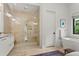 Spa-like bathroom with large shower and soaking tub at 16920 Villalagos De Avila, Lutz, FL 33548