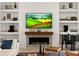 Living room with built-in shelving, fireplace, and a sleek modern feel at 16920 Villalagos De Avila, Lutz, FL 33548