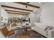 Open and airy living space with comfortable seating and exposed beams at 16920 Villalagos De Avila, Lutz, FL 33548