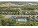 Aerial view of Preserve at West Villages community, showing homes, pool, and amenities at 20644 Swallow Tail Ct, Venice, FL 34293