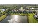 Aerial view showcasing the property's location near a lake at 20644 Swallow Tail Ct, Venice, FL 34293