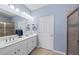 Double vanity bathroom with a large shower at 20644 Swallow Tail Ct, Venice, FL 34293