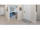Bright and spacious entryway with tile flooring, leading to living room at 20644 Swallow Tail Ct, Venice, FL 34293