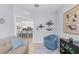 Sitting area with a view into the kitchen, comfortable seating at 20644 Swallow Tail Ct, Venice, FL 34293