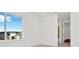 Bright bedroom with large window offering a community view at 32354 Wetland Bird Vw, San Antonio, FL 33576