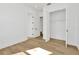 Spacious bedroom with hardwood floors and large closet at 32354 Wetland Bird Vw, San Antonio, FL 33576