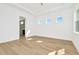 Light and airy bedroom with hardwood floors and access to bathroom at 32354 Wetland Bird Vw, San Antonio, FL 33576