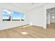 Bright bedroom with hardwood floors and scenic views at 32354 Wetland Bird Vw, San Antonio, FL 33576