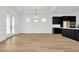 Bright dining room with hardwood floors and access to patio at 32354 Wetland Bird Vw, San Antonio, FL 33576