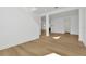 Bright hallway with hardwood floors and views to living areas at 32354 Wetland Bird Vw, San Antonio, FL 33576