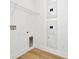 Laundry room with shelving and utility hookups at 32354 Wetland Bird Vw, San Antonio, FL 33576