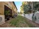 Private backyard with AC units and a grassy area at 5162 Bay Isle Cir, Clearwater, FL 33760