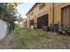 Private backyard with spacious grassy area at 5162 Bay Isle Cir, Clearwater, FL 33760