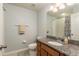 Simple bathroom with granite vanity and shower at 5162 Bay Isle Cir, Clearwater, FL 33760