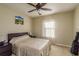 Cozy bedroom featuring a comfortable bed and calming decor at 5162 Bay Isle Cir, Clearwater, FL 33760