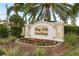 Bay Isle Landings community entrance sign with flowers at 5162 Bay Isle Cir, Clearwater, FL 33760