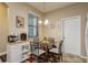 Cozy breakfast nook with glass top table and four chairs at 5162 Bay Isle Cir, Clearwater, FL 33760