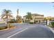 Gated community entrance with palm trees at 5162 Bay Isle Cir, Clearwater, FL 33760