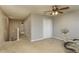 Upstairs hallway with carpet and access to bedrooms at 5162 Bay Isle Cir, Clearwater, FL 33760