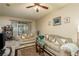 Living room with two sofas, a coffee table, and a ceiling fan at 5162 Bay Isle Cir, Clearwater, FL 33760