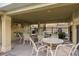 Community patio with tables and chairs at 5162 Bay Isle Cir, Clearwater, FL 33760