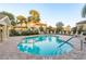 Community pool with plenty of lounge chairs at 5162 Bay Isle Cir, Clearwater, FL 33760