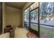 Relaxing screened porch overlooking the backyard at 5162 Bay Isle Cir, Clearwater, FL 33760