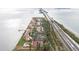 Aerial view of waterfront community, highlighting building layout and amenities at 7540 Sunshine Skyway S Ln # 220, St Petersburg, FL 33711