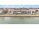 Two-story condo building with waterfront access and balconies at 7540 Sunshine Skyway S Ln # 220, St Petersburg, FL 33711