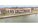 Two-story condo building with waterfront access and balconies at 7540 Sunshine Skyway S Ln # 220, St Petersburg, FL 33711