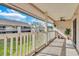 Balcony with tiled floor, ceiling fan, and courtyard view at 3714 Greenery Ct # 214, Tampa, FL 33618