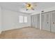 Bedroom with ceiling fan and window, carpeted floor at 3714 Greenery Ct # 214, Tampa, FL 33618