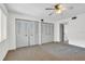 Spacious bedroom with ceiling fan and ample closet space at 3714 Greenery Ct # 214, Tampa, FL 33618