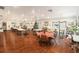 Large community room with tables, chairs, and holiday decorations at 801 83Rd N Ave # 511, St Petersburg, FL 33702