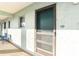 A unit entrance showing front door with screen, and the unit number '511' at 801 83Rd N Ave # 511, St Petersburg, FL 33702