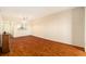 Living room has hard wood floors and an open kitchen with a bar countertop at 801 83Rd N Ave # 511, St Petersburg, FL 33702