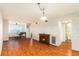 The living room has hard wood floors, a fireplace and room for a piano at 801 83Rd N Ave # 511, St Petersburg, FL 33702