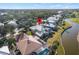 Aerial view showcasing home's location in a waterfront community at 418 Cardiff Rd, Venice, FL 34293