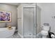 Elegant bathroom featuring a soaking tub, walk-in shower, and modern fixtures at 418 Cardiff Rd, Venice, FL 34293