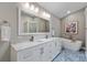 Elegant bathroom with double vanity and soaking tub at 418 Cardiff Rd, Venice, FL 34293