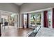 Main bedroom with serene views and private access at 418 Cardiff Rd, Venice, FL 34293