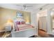 Charming bedroom with a comfortable bed and built-in wardrobe at 418 Cardiff Rd, Venice, FL 34293