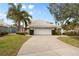 Well maintained home with two car garage and landscaped yard at 418 Cardiff Rd, Venice, FL 34293