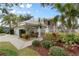 Two-story house with landscaped yard and attached garage at 418 Cardiff Rd, Venice, FL 34293