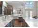 Gourmet kitchen features marble countertops, custom cabinetry, and high-end appliances at 418 Cardiff Rd, Venice, FL 34293