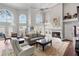 Spacious living room with fireplace and high ceilings at 418 Cardiff Rd, Venice, FL 34293