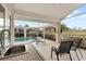 Inviting pool and spa area with outdoor kitchen at 418 Cardiff Rd, Venice, FL 34293