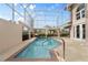 Relaxing screened pool and spa with a view at 418 Cardiff Rd, Venice, FL 34293